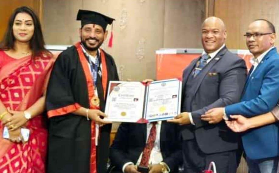 Sri.Duvvada Srinivas, Mlc being honoured with Honorary Doctorate by Dayspring International University at IIFA Conference by Dr.Mark Burns, Spiritual Advisor to President of USA Donald Trump.